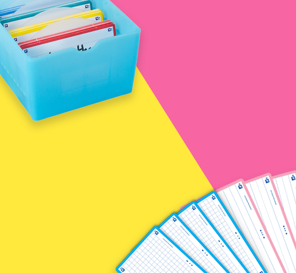 Colorful file folders in a blue holder on a yellow and pink background