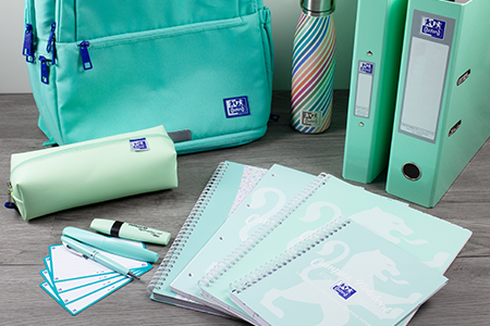 Oxford Mint Green Backpack, Pencil Case, A4 Notebook, A5 Notebook, Ring Binder, Flash Cards, Pelikan Pens on desk