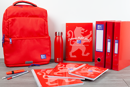 Oxford Red Backpack, Water Bottle, A4 Notebook, A4 Refill Pad, Ring Binder, Pelikan Pen on desk