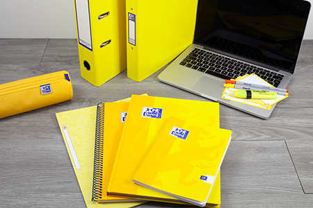 Oxford Yellow A4 Notebook, A5 Notebook, Pencil Case, Ring Binder, Pelikan Pens on desk